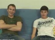 Couple straight boys on sofa