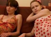 Two bored girls on the couch make oral