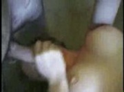 Skinny blonde 69ing upside on a couch