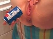 Girl Insert A Pepsi Can