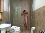 Hot muscled guy jerking under shower