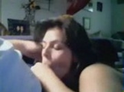 Brunette girl sucks and swallows a load of cum