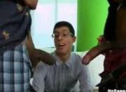 White geek sucks two massive black dicks