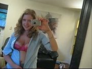 Busty girl next door Andy Lynn takes picture of herself in the mirror