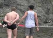 Young gay twink bound in ropes on a beach and used like a slave toy in group pervert sex