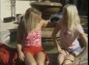 Blonde lesbians toying at outdoors
