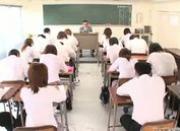 Japanese couple fucks in the middle of a school classroom