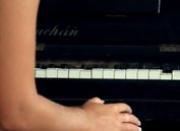 Busty blond toying snatch on the piano