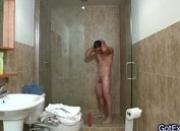 Hot muscled guy jerking under shower