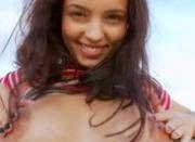stunning busty brunette with black toy