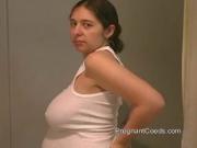 Pregnant Brunette with saggy Boobs