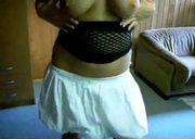 Busty blonde giving blowjob and smoking