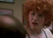 Anita Morris is a sexy redhead milf
