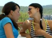 two beautiful lesbian and dildo outside