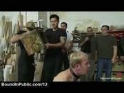 Gay with box on his head gives blowjobs in wood shop