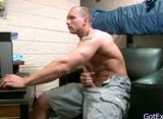 Muscled dude wanking