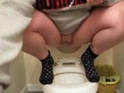 Piss peeing in toilet