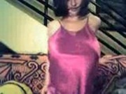 Girl in pink satin nightie