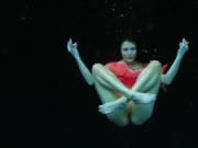 Petite babes with big tits underwater