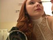 Redhead puts on makeup