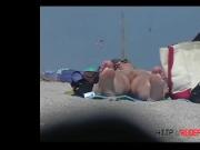 Beach porno of a hairy white large lipped pussy bathing in the sun