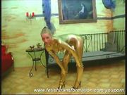 Crazy girl complete painted in gold (clip)