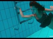 Submerged underwater babe Nata swimming naked