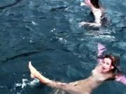 Underwater swimming girls on Tenerife