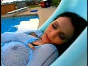 Angie plays with herself at the pool