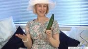 Mature housewife fucks a cucumber