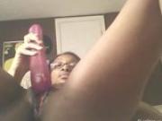 Ebony teen masturbates with dildo