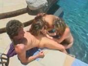 Two hot girls tag team a guy by the pool