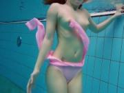 Small tits brunette teen Liza Bubarek swimming in the pool