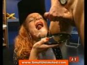 Redhead cowgirl eats cum from plate
