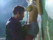 Pamela Anderson against wall sex scene