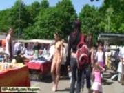 Naked cutie has fun in public streets