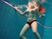 Nude babe Vesta shows herself nude underwater