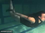 Shaved brunette sissy Irina Polcharova naked in the pool