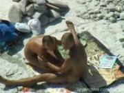 Hot couple gets caught on camera having sex on the beach