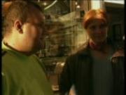 Big guy meets up with carefree redhead