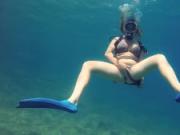 Croatian chick Kasandra strips and masturbates in water
