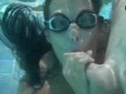 Submerged underwater with a dick inside her