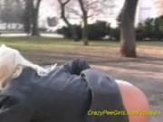 blonde chick pissing in public
