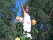 brunette dancing in the garden