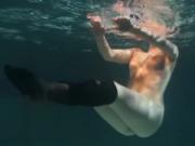 Dressed underwater beauty Bulava Lozhkova swimming naked