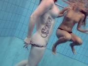Katrin swims and strips Lucy in the swimming pool