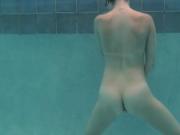 Young babe Emie Amfibia gets orgasms in the swimming pool