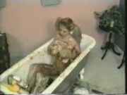 Big titted hottie takes a bath of food - Pt. 2/4