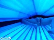 teen latina college student gives lesbian pussy a massage in tanning bed