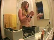Sexy Kissy gets made up in her bathroom
